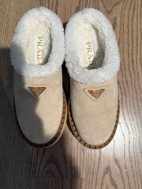 Prada Beige Suede Shearling Slip-On Clogs with Gold Logo